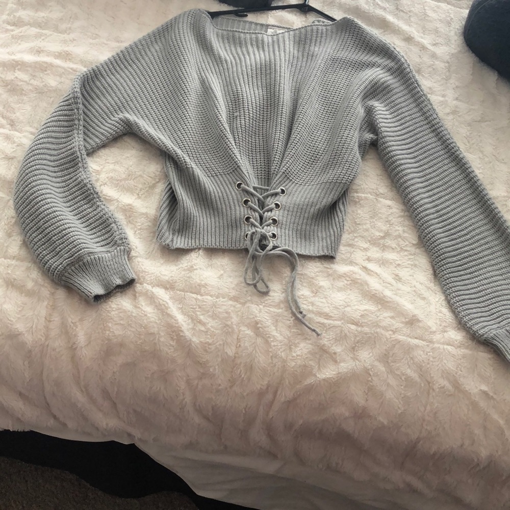 L light greyish almost blue sweater